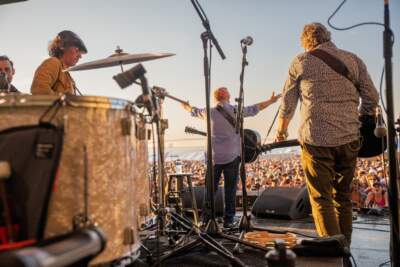 Paul Simon with his band onstage at the 2022 Newport Folk Festival. (Courtesy Rett Rogers)