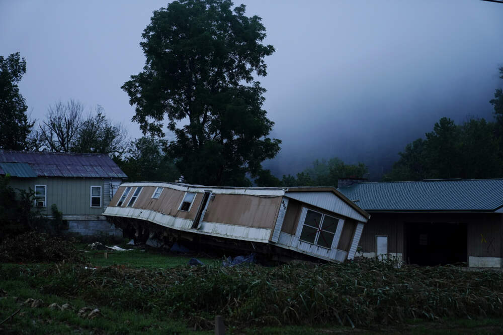 A trailer home was swept away by massive flooding near Lost Creek, Ky. As residents continued cleaning up from the late July floods that several people, rain started falling on already saturated ground in eastern Kentucky late Friday morning. (Brynn Anderson/AP)