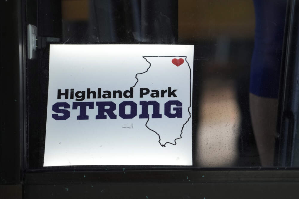A Highland Park Strong sign is displayed at a restaurant in Highland Park. (Nam Y. Huh/AP)