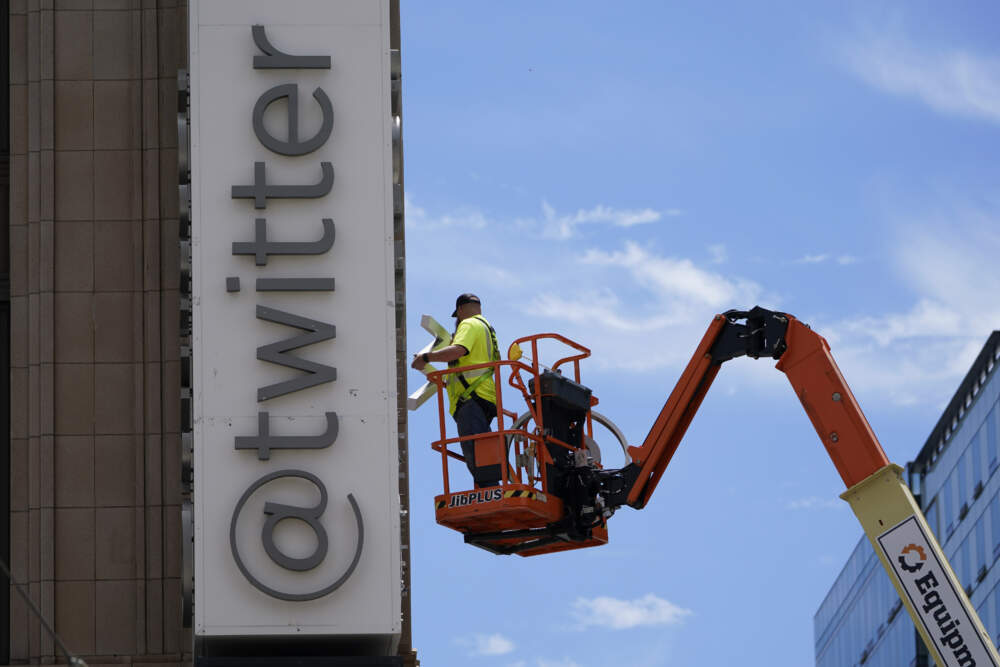 A workman removes a character from a sign on the Twitter headquarters building in San Francisco. Elon Musk has unveiled a new &quot;X&quot; logo to replace Twitter's famous blue bird as he follows through with a major rebranding of the social media platform he bought for $44 billion last year. (Godofredo A. Vásquez/AP)
