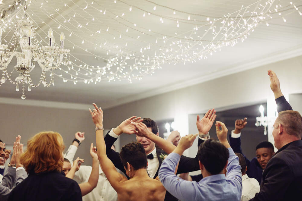 People dancing at a wedding reception. (Getty Images)