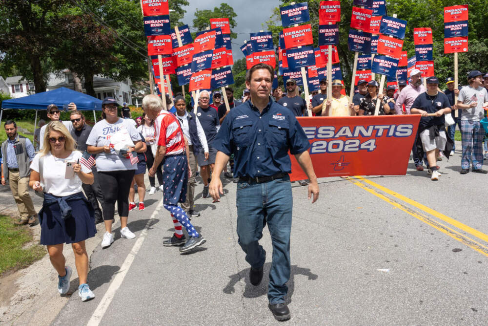 Florida Governor and Republican Presidential candidate Ron DeSantis marches in a Fourth of July parade, July 4, 2023, in Wolfeboro, New Hampshire.(Andrew Lichtenstein/Corbis via Getty Images)