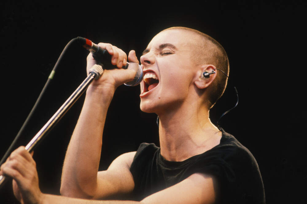 Sinead O'Connor (1966 - 2023) performs at the Torhout/Werchter Festival in Torhout, Belgium on July 7, 1990. (Gie Knaeps/Getty Images)