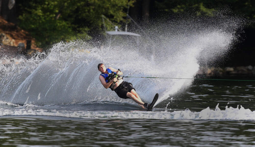 A man water skies on Lake Winnipesaukee, Sunday, Aug. 18, 2013 in Alton, N.H. (Jim Cole/AP)