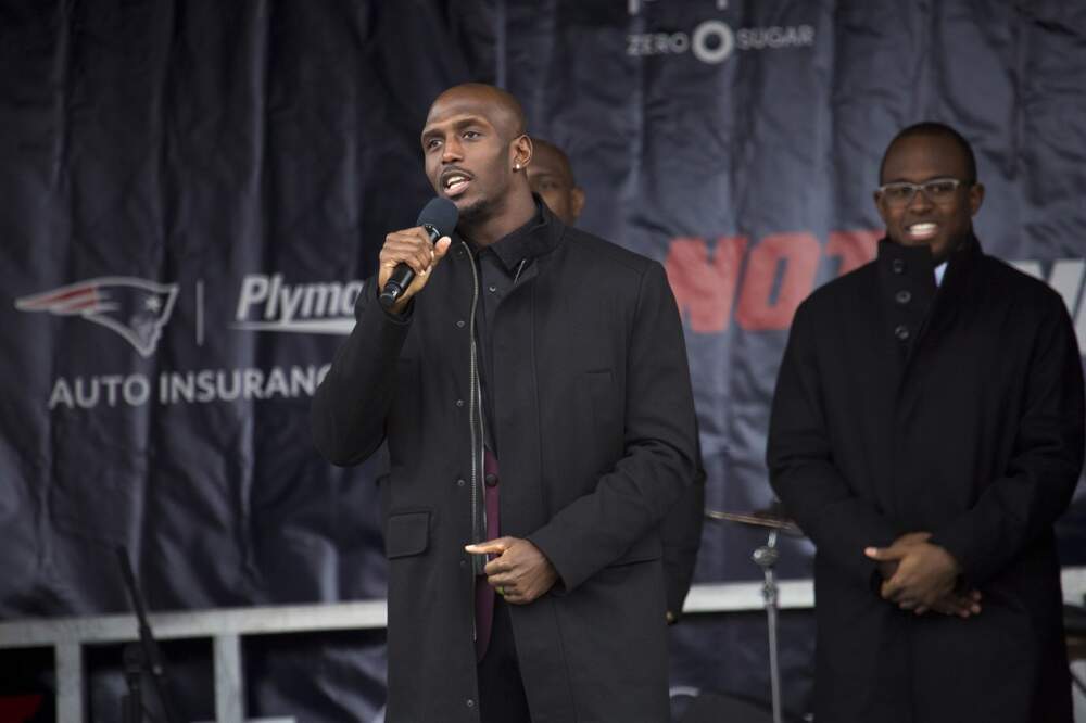 Devin McCourty speaks to the crowd during the Patriots' send-off rally in Foxborough before Super Bowl 52 in 2018. (Jesse Costa/WBUR)