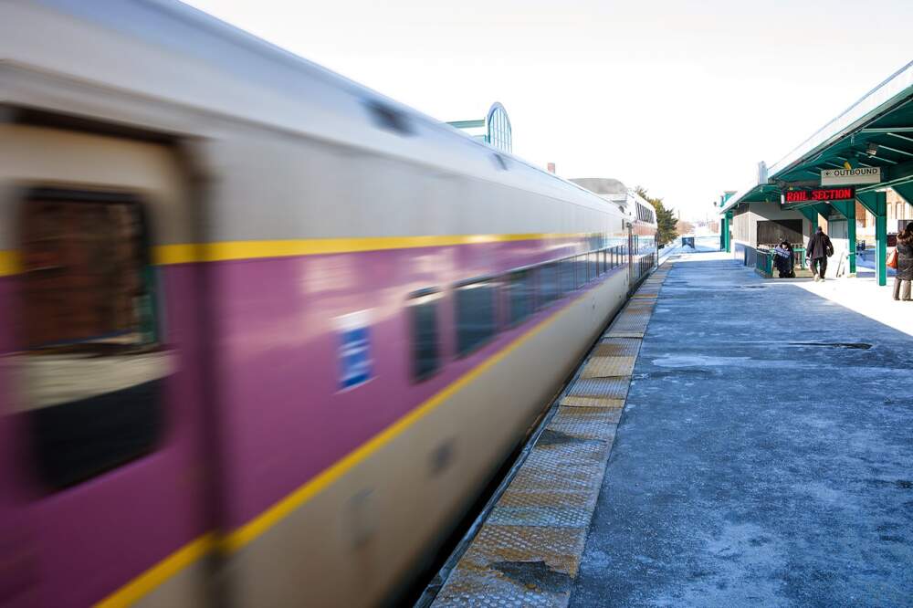 In this 2015 photo, an MBTA commuter rail train leaves Lynn station. The station has been closed for repairs since October of 2022. (Jesse Costa/WBUR)