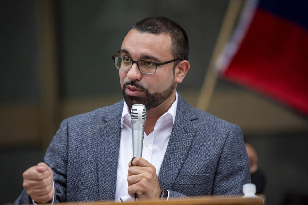 Boston City Councilor Richardo Arroyo speaks during a demonstration at the John F. Kennedy Federal Building in downtown Boston in September 2021. (Jesse Costa/WBUR)