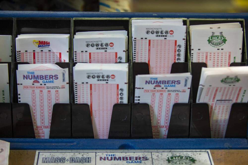 Massachusetts Lottery number tickets at a display counter at College Convenience on Huntington Ave. (Jesse Costa/WBUR)
