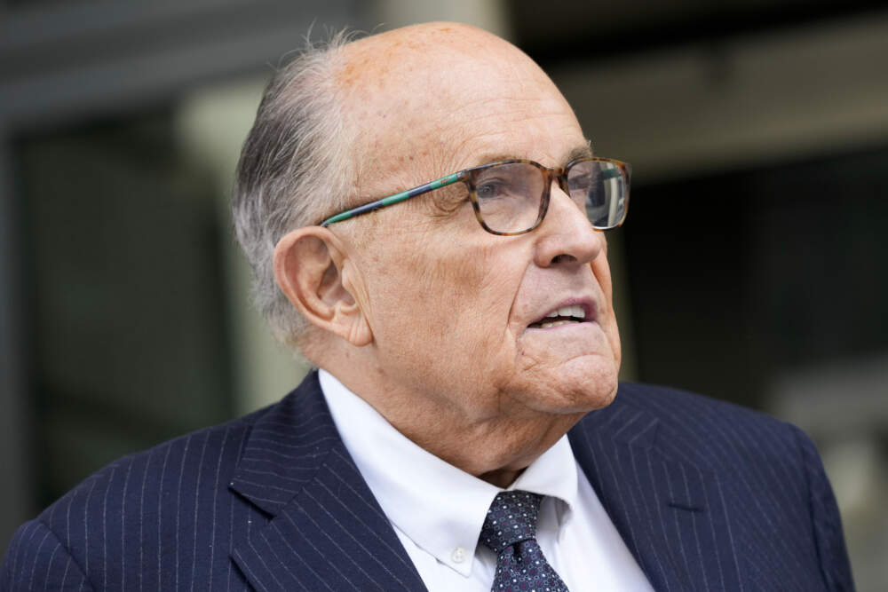 Rudy Giuliani speaks with reporters as he departs the federal courthouse. (Patrick Semansky/AP)