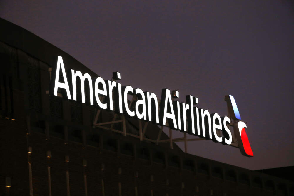 The American Airlines logo is seen atop the American Airlines Center in Dallas. (Michael Ainsworth/AP)
