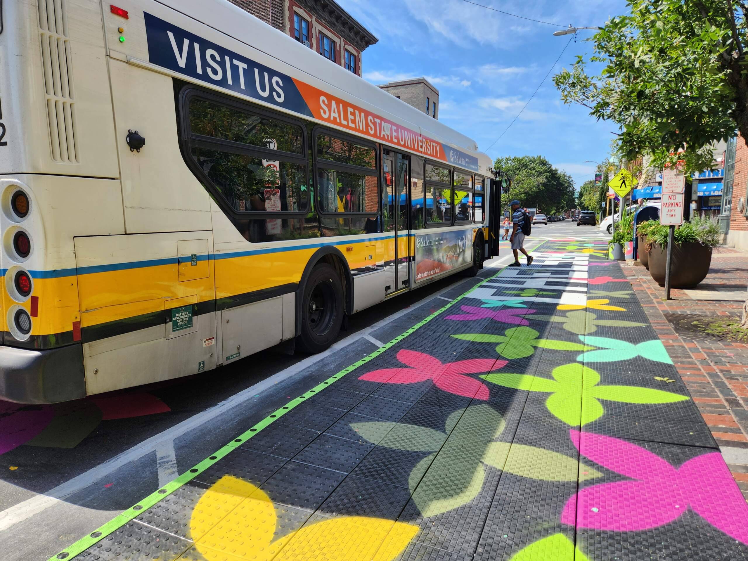 A bus ramp is being piloted at Broadway and 3rd Street in Chelsea. The city unveiled the ramp and an accompanying art installation called Flower Walk at the bus stop where the ramp is located.