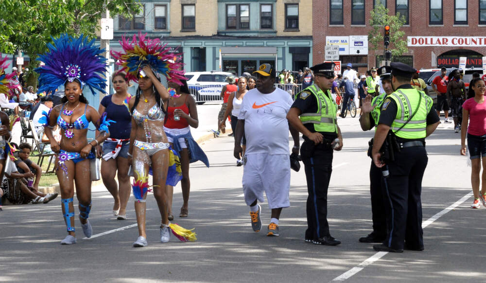 In this file photo from 2015, Revelers attend the annual Caribbean Carnival and parade in Dorchester. (Ted Fitzgerald/MediaNews Group/Boston Herald via Getty Images)