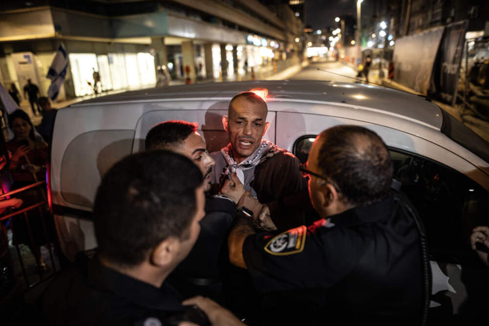 Israeli police intervene in a protest as Arab-Israelis and a group that supports them march from Habima Square to Kaplan Street on August 26, 2023. (Photo by Mostafa Alkharouf/Anadolu Agency via Getty Images)