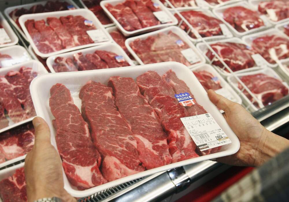 A customer looks at a U.S. beef product. (Koichi Kamoshida/Getty Images)