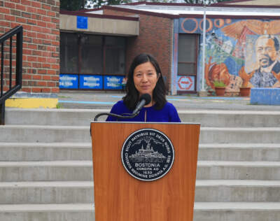 Mayor Michelle Wu outside Trotter Elementary in Roxbury (Emily Piper-Vallillo/WBUR)
