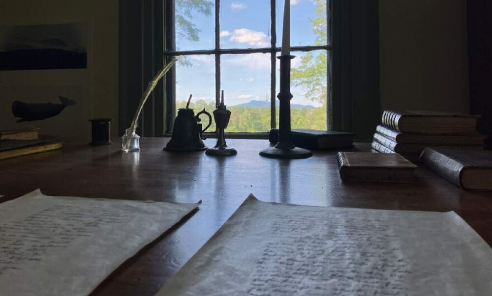 A replica of author Herman Melville's desk in Pittsfield, Massachusetts, where he could see Mount Greylock through the window. Melville wrote &quot;Moby-Dick&quot; here on the property called Arrowhead. The house is now a historic museum run by the Berkshire County Historical Society. (Nancy Eve Cohen/NEPM)