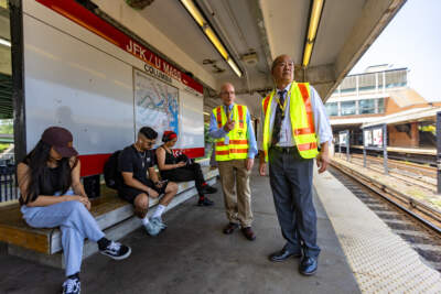 General Manager and CEO, Philip Eng, and the MBTA’s newly hired Chief of Stations, Dennis Varley visit JFK/UMASS station in Dorchester to assess the repairs needed to be done to the station. (Jesse Costa/WBUR)