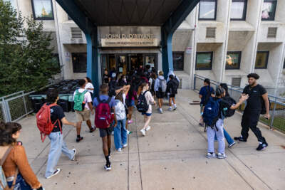 Students file into the John D. O’Bryant School on the first day of school. (Jesse Costa/WBUR)