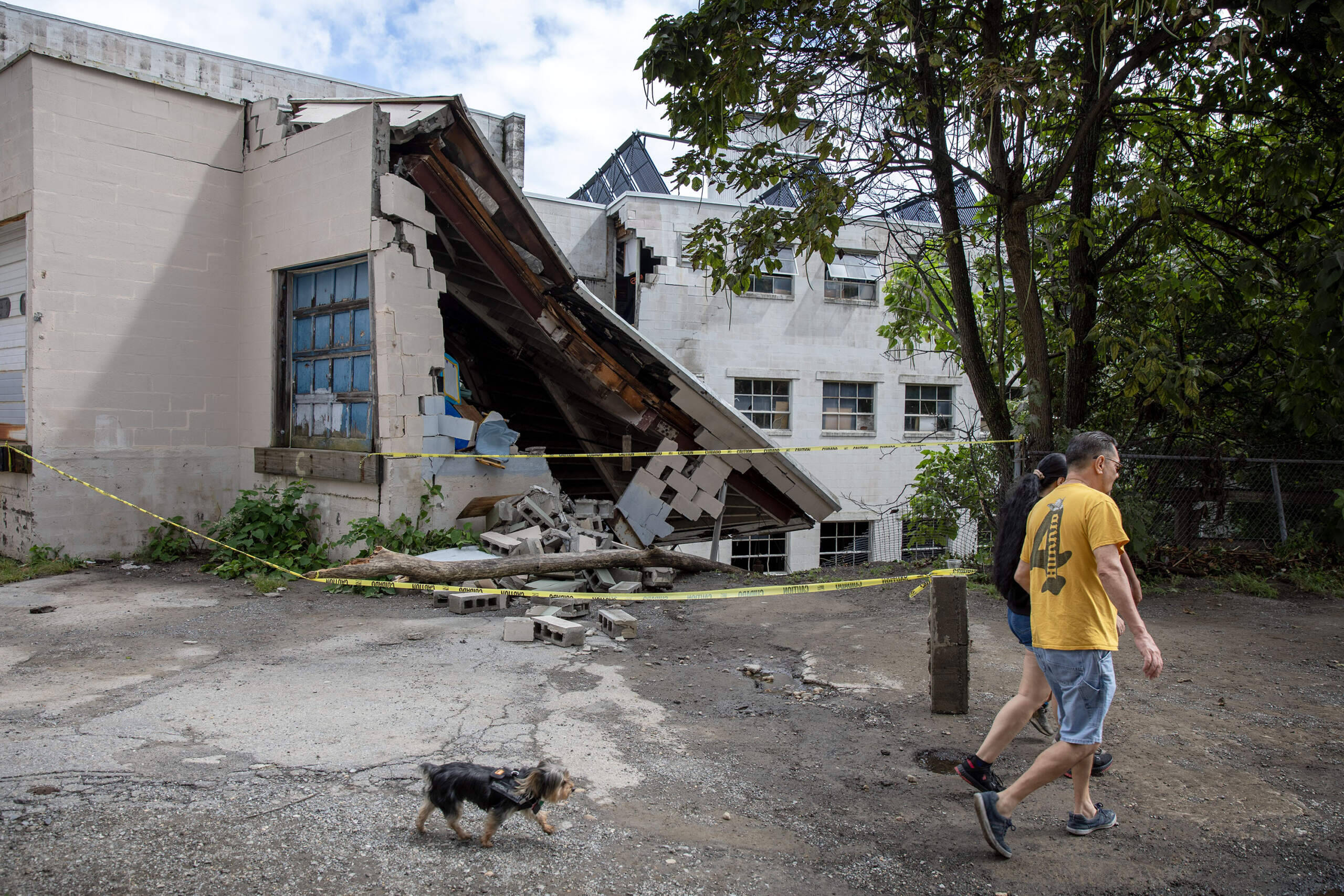 A building on Water Street by Monoosnoc Brook in Leominster, collapsed when the brook flooded after 11 inches of rain fell on city. (Robin Lubbock/WBUR)
