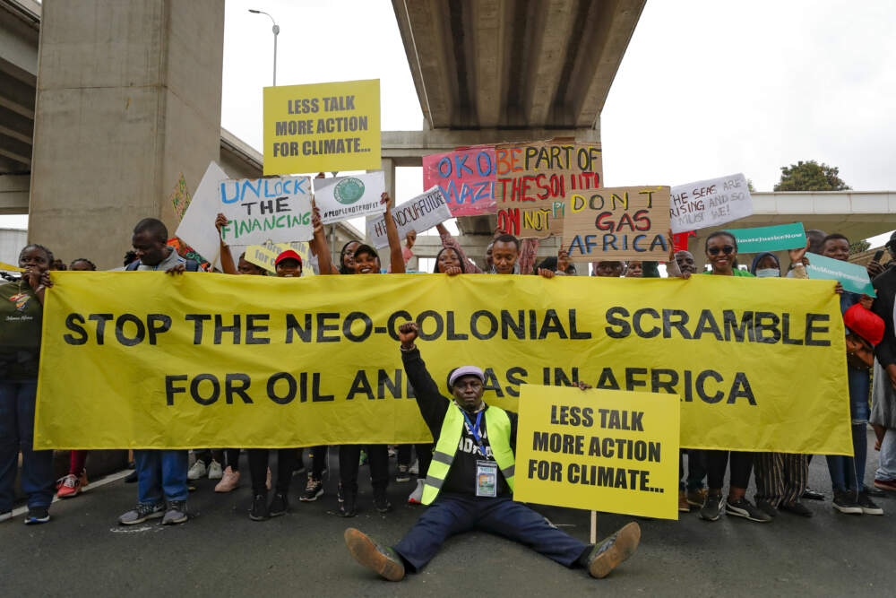 Protesters pose as they demand action on climate change, during a demonstration in Nairobi, Kenya. (Brian Inganga/AP)