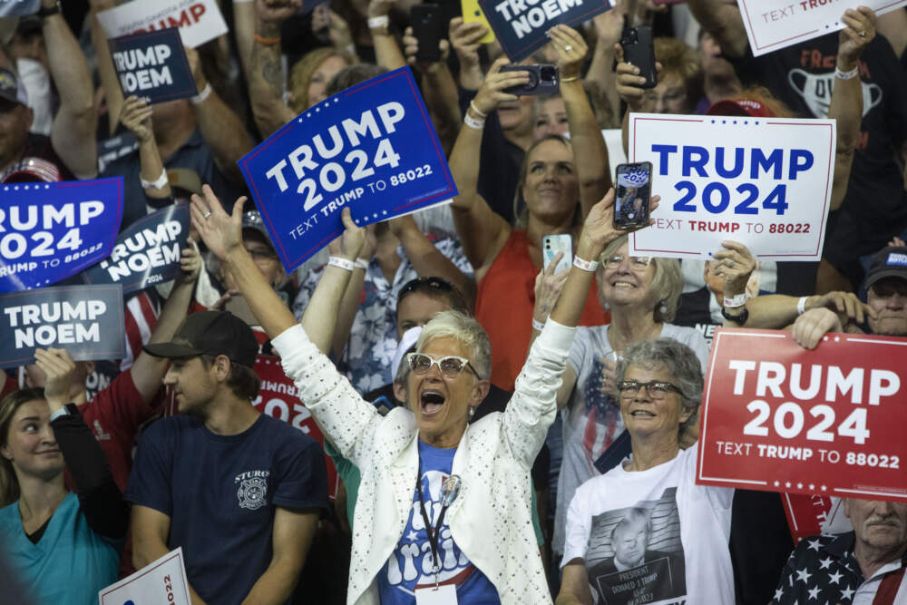 Supporters of former President Donald Trump cheer at the South Dakota Republican Party Monumental Leaders rally on Sept. 8, 2023. (Toby Brusseau/AP)