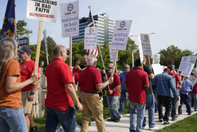 United Auto Workers march outside the Stellantis North American Headquarters. (Carlos Osorio/AP)