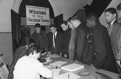 High School students from Scituate, Mass., register to attend Freedom School at Tremont St. Methodist Church in South End of Boston on Feb. 26, 1964. African American leaders and other civil rights groups have called for boycott protesting alleged de factor segregation in Boston schools. (AP Photo)
