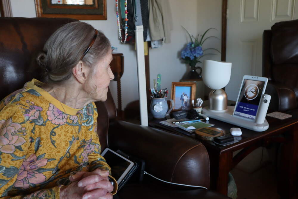 Jan Worrell, 83, and her AI-powered companion robot named ElliQ interact throughout the day at her home on the Long Beach Peninsula. (Tom Banse/Northwest News Network)