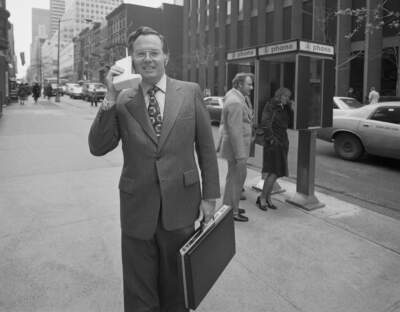 In 1973, Motorola vice president John F. Mitchell demonstrated the Dyna T-A-C Portable Radio Telephone System. He said the phone would allow a user to call from anywhere in the metropolitan area to any telephone in the world. (Bettmann/Getty Images)