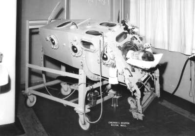 An iron lung at Boston Children’s Hospital. (Courtesy of March of Dimes Archives)