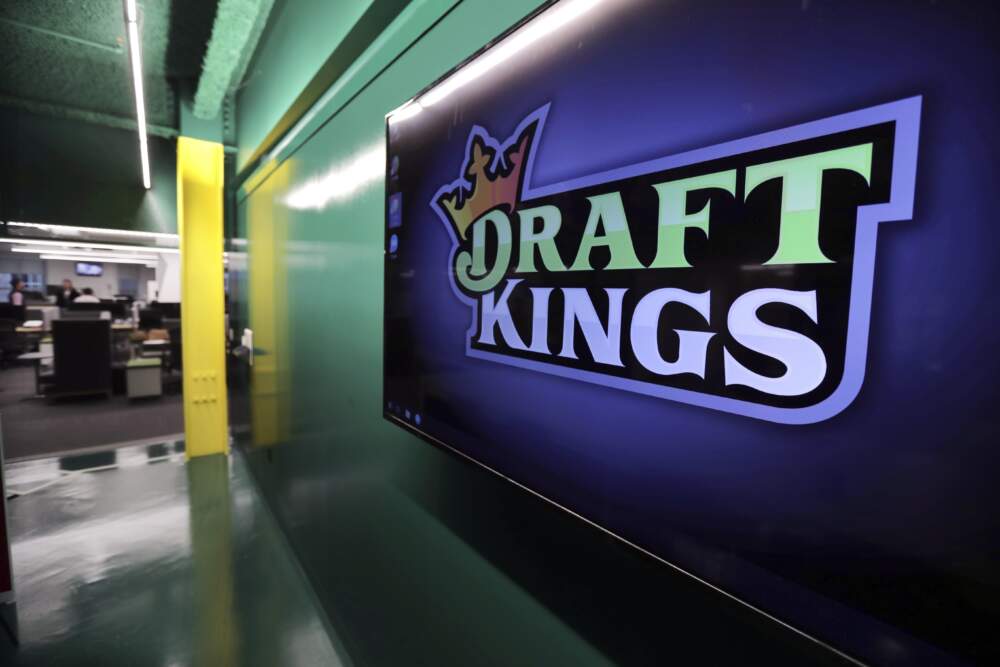 The DraftKings logo is displayed at the sports betting company headquarters, May 2, 2019, in Boston. (Charles Krupa/AP)