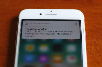 The first test of the national wireless emergency system by the Federal Emergency Management Agency is shown on a cellular phone in Detroit im 2018. (Paul Sancya/AP)