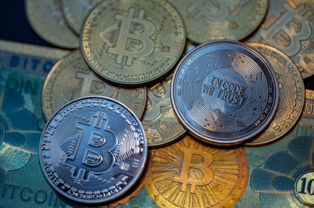 Bitcoin  logo displayed on mobile with representation of  Bitcoins cryptocurrencies seen in this photo illustration. on 17 January 2023 in Brussels, Belgium. (Photo illustration by Jonathan Raa/NurPhoto via Getty Images)