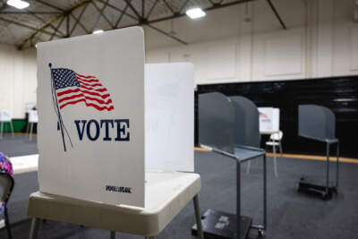 A voting booth is seen. (Jon Cherry/Getty Images)