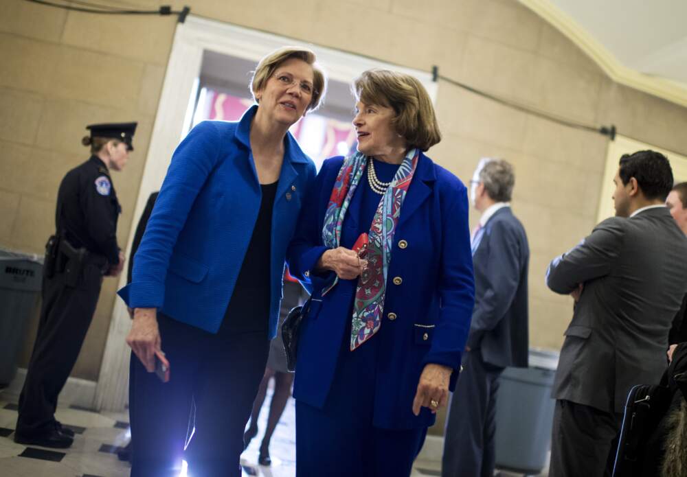 Sens. Elizabeth Warren, left, and Dianne Feinstein, right, leave President Barack Obama's State of the Union address in the Capitol in 2014. (Tom Williams/CQ Roll Call, Getty Images)