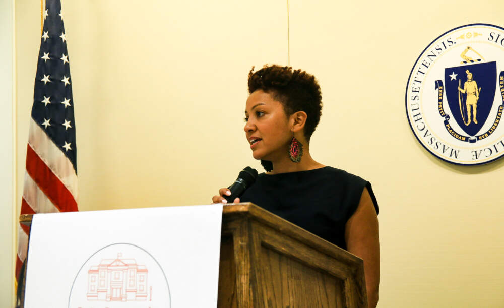 Karilyn Crockett, Co-Chair of the Boston Desegregation & Busing Initiative, addresses attendees of the program launch. (Emily Piper-Vallillo/WBUR)