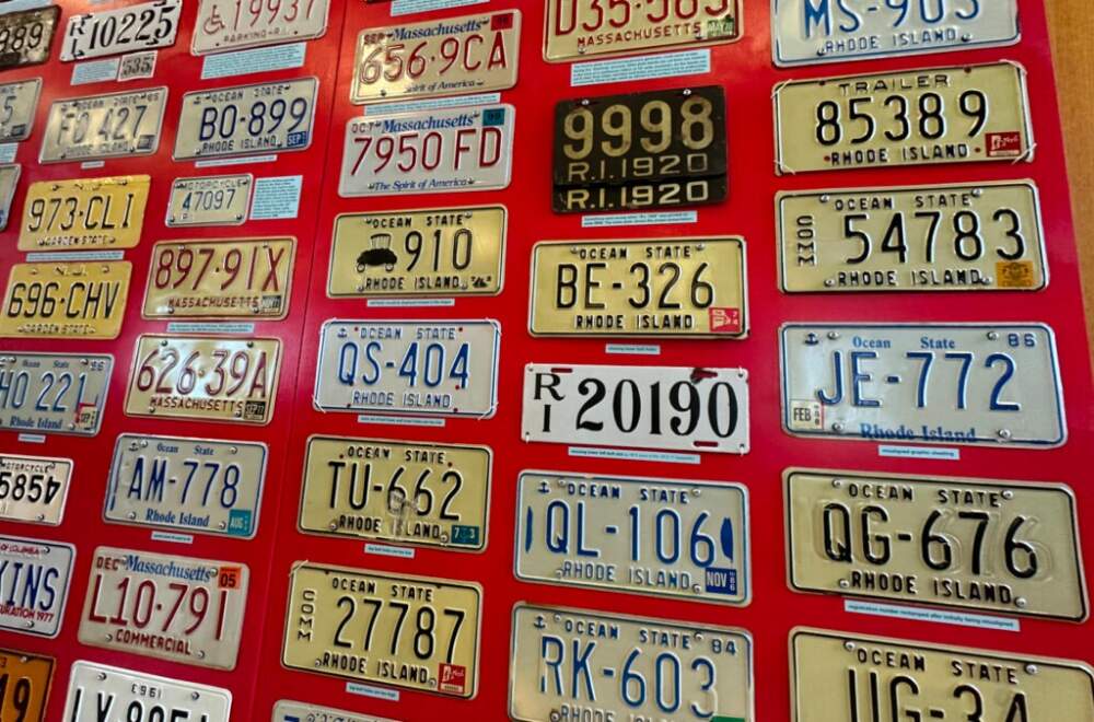 Collectors create vast displays to reflect the swap meet’s theme. This time’s theme was “error plates” that had mistakes on them. (Jordan Pascale/WAMU/DCist)