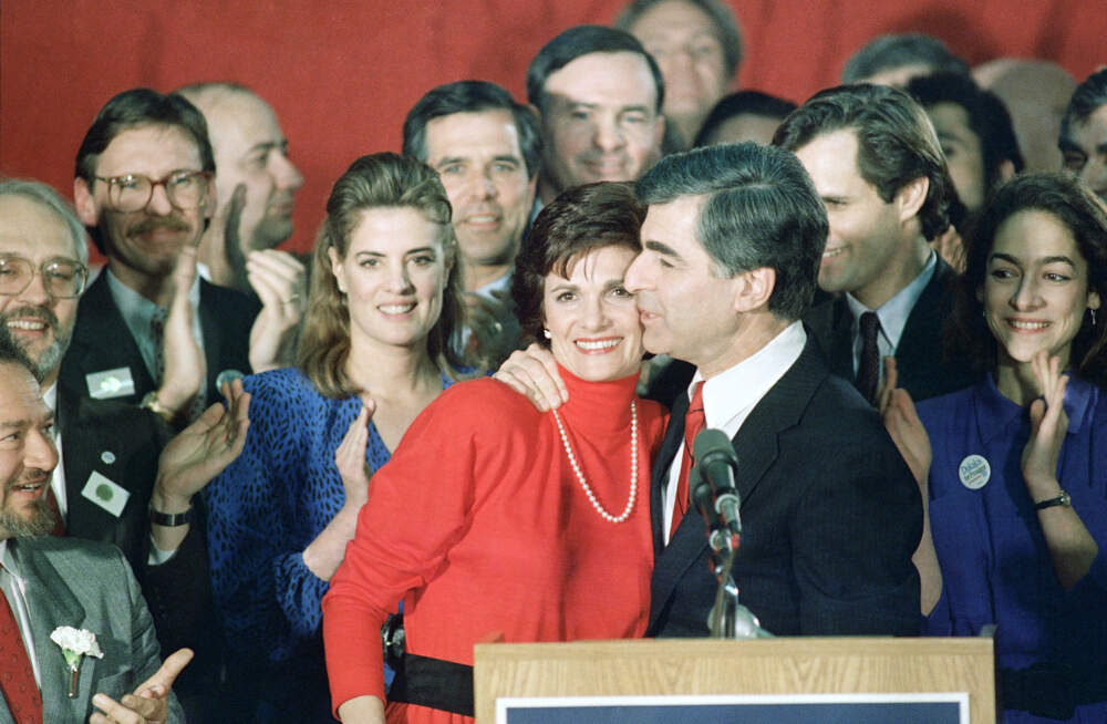 Mass. Gov. Michael Dukakis hugged his wife, Kitty, after winning the Democratic primary in Manchester, New Hampshire on Feb. 16, 1988. (Jim Cole/AP)