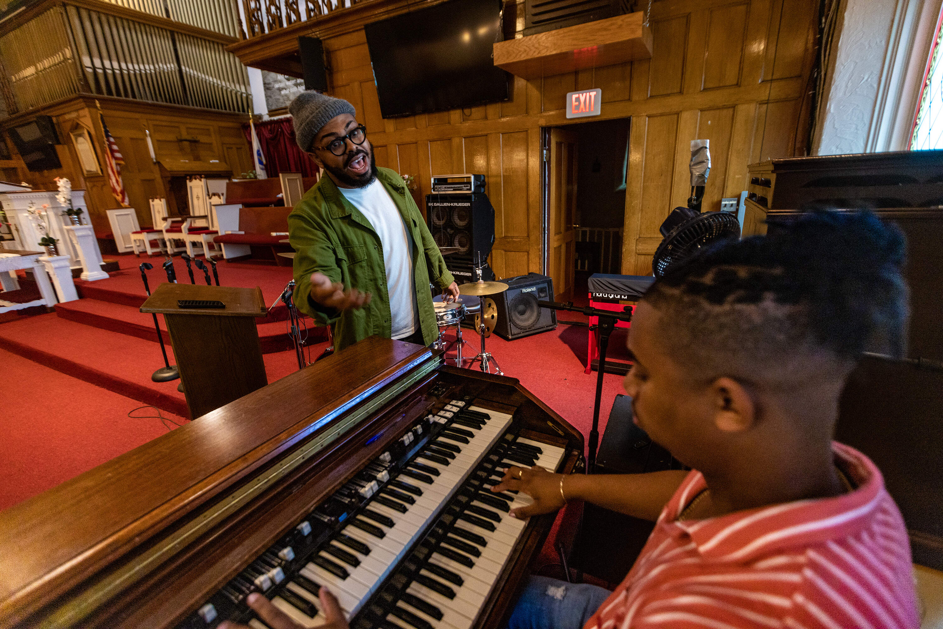 Singer Danny Rivera and organist Gavin Rushing perform at the Holy Tabernacle Church in Dorchester. (Jesse Costa/WBUR)