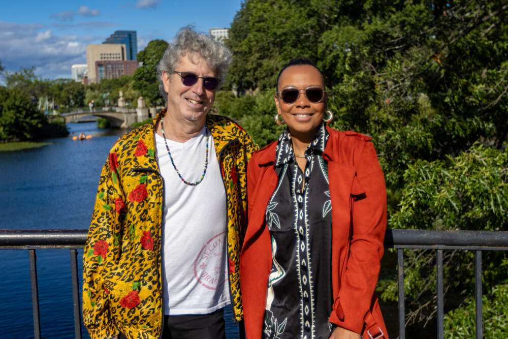Ken Field and Zahili Zamora, co-curators of Jazz on the Charles, standing on the Esplanade along the Charles River where performances will be held. (Jesse Costa/WBUR)