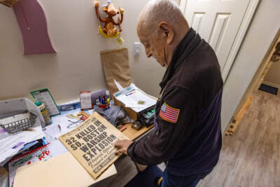 Jim Tsihlis saved a copy of the October 17, 1953 issue of the Daily Record, which reported the previous day's explosion on the USS Leyte. (Jesse Costa/WBUR)