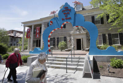People walk near an entrance to The Amazing World of Dr. Seuss Museum, one of the Springfield Museums. (Steven Senne/AP)