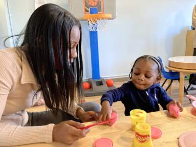 Jazzmine Pryor said her 20-month-old son loves the playroom at their family shelter in Boston. But many other children in the state's family shelter system don't have access to play spaces. (Gabrielle Emanuel/WBUR)