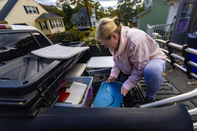Deb Libby loads her belongings into her pick-up truck as she is evicted from her apartment in Worcester. (Jesse Costa/WBUR)