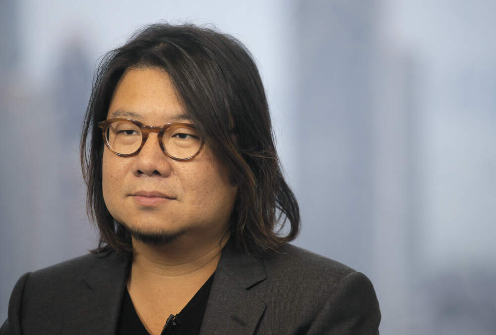 In this Friday, Aug. 25, 2017, photo, Singaporean novelist Kevin Kwan listens to a reporter's questions during an interview in Hong Kong. Kwan was in Hong Kong promoting the third and last book in his 'Crazy Rich' trilogy – 'Rich People Problems.' His first book &quot;Crazy Rich Asians&quot; released in 2013, rose quickly in the charts and became a best seller. (Vincent Yu/AP)