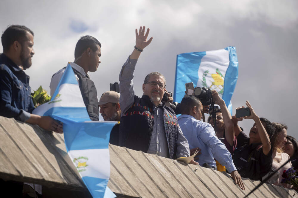 President-elect Bernardo Arévalo, the son of Juan Jose Arévalo, Guatemala's first democratically elected president in 1945, waves to those attending the commemoration of the 1944 Revolution in the Human Rights Plaza in Guatemala City. (Santiago Billy/AP)