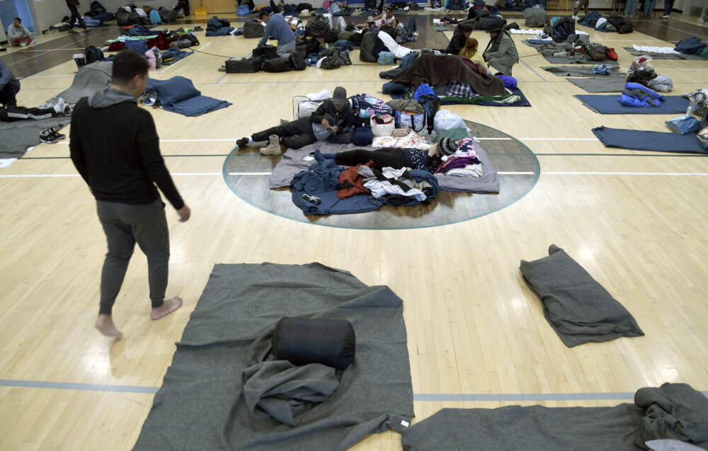 Migrants rest at a makeshift shelter in Denver, Jan. 6, 2023. (Thomas Peipert/AP)
