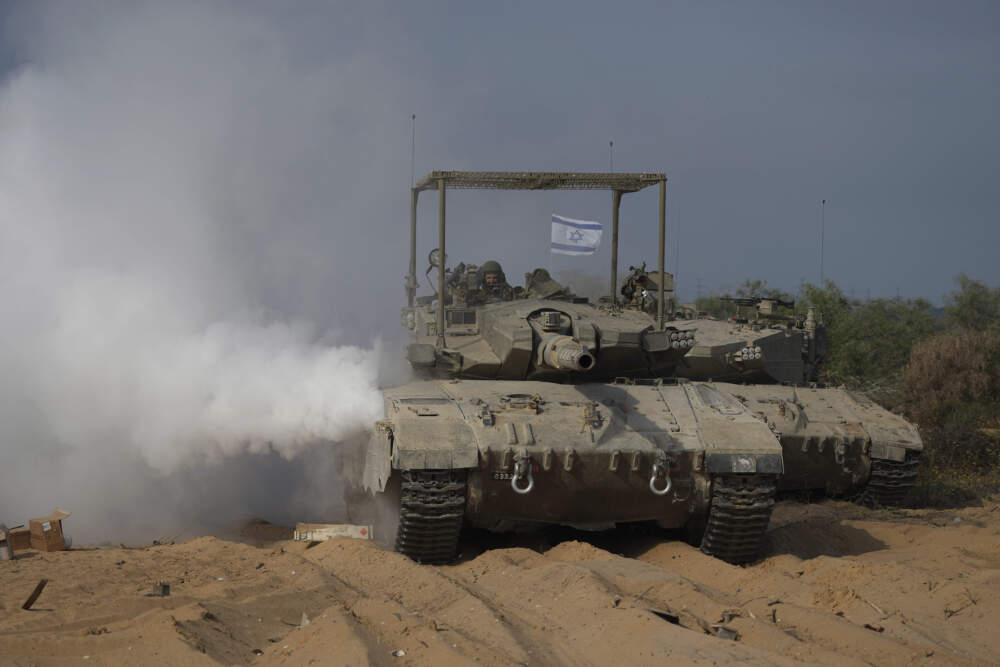 Israeli tanks manoeuvre near the Israeli-Gaza border, southern Israel, Monday, Nov. 13, 2023. (Tsafrir Abayov/AP)
