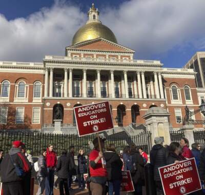 Striking Andover teachers picketing on Beacon Hill Tuesday, Nov. 14, 2023, in Boston. (Steve LeBlanc/AP)