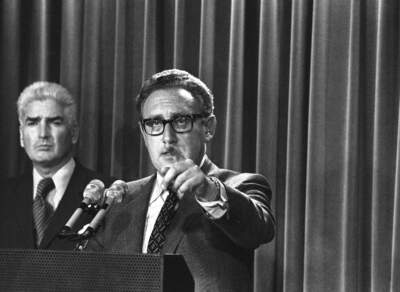 Presidential adviser Henry Kissinger gestures as he speaks. (AP Photo/File)